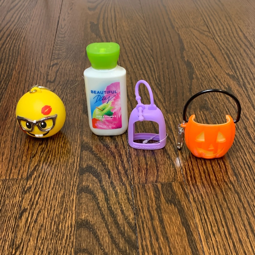 3 hand sanitizer cases and 1 Lotion